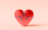 Conceptual image of a red heart with a line graph in front symbolizing Heart or ECG