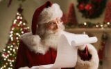 Santa Claus with checklist, portrait, close-up