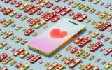 Mobile phone with heart symbol and icons