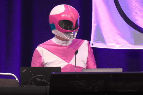 Hacker Martha Root on the stage of the Chaos Communication Congress (39C3) in Hamburg, Germany, an annual cybersecurity conference.
