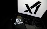 The Grok logo appears on a phone and the xAI logo is displayed on a laptop.